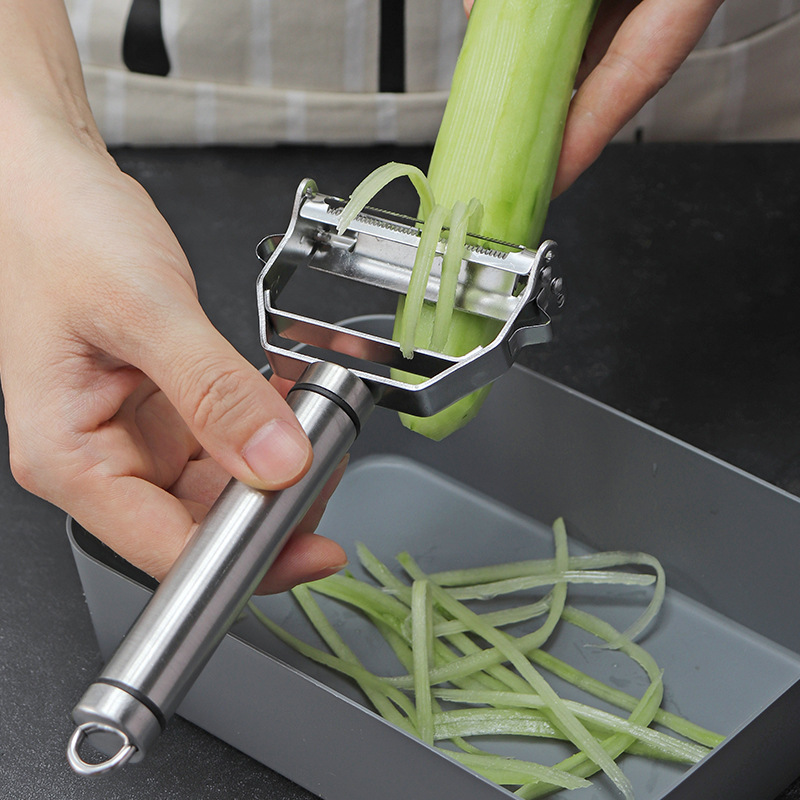 Pelador multifunción de acero  - Household Kitchen Gadgets Vegetable Cutter Silk Cutter reseña y precio